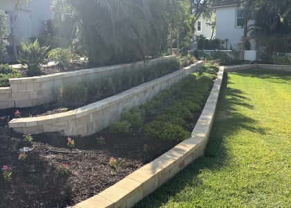 Retaining wall installed in Florida front yard.